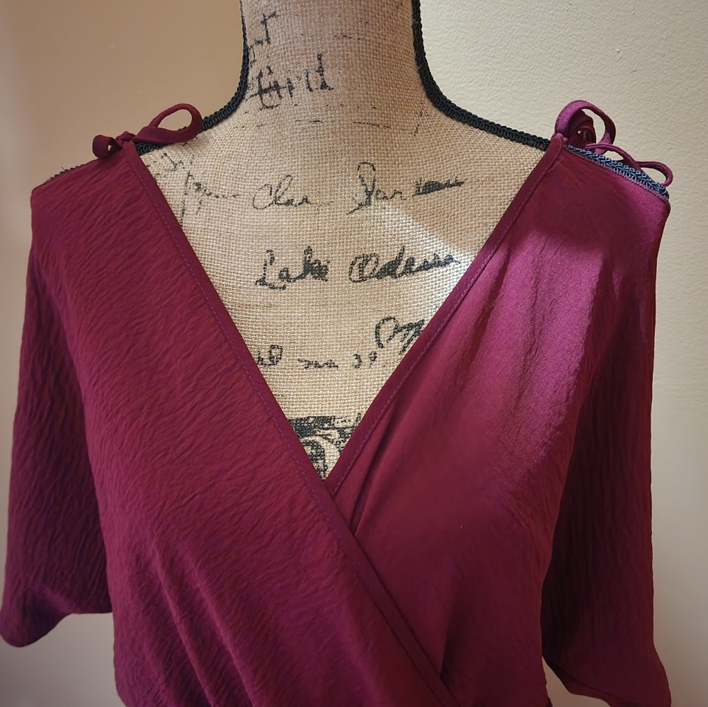 Women's purple jumpsuit, size L.